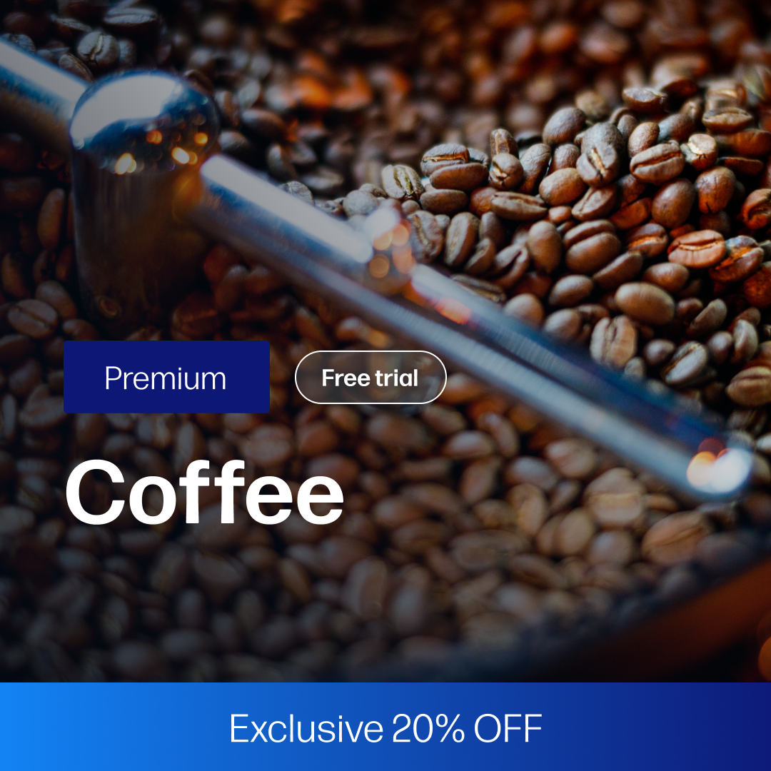 Close-up of roasted coffee beans with a metal stirring tool, highlighting detailed market data and price forecasting for the Coffee Market Reports Subscription | Premium (20% OFF).