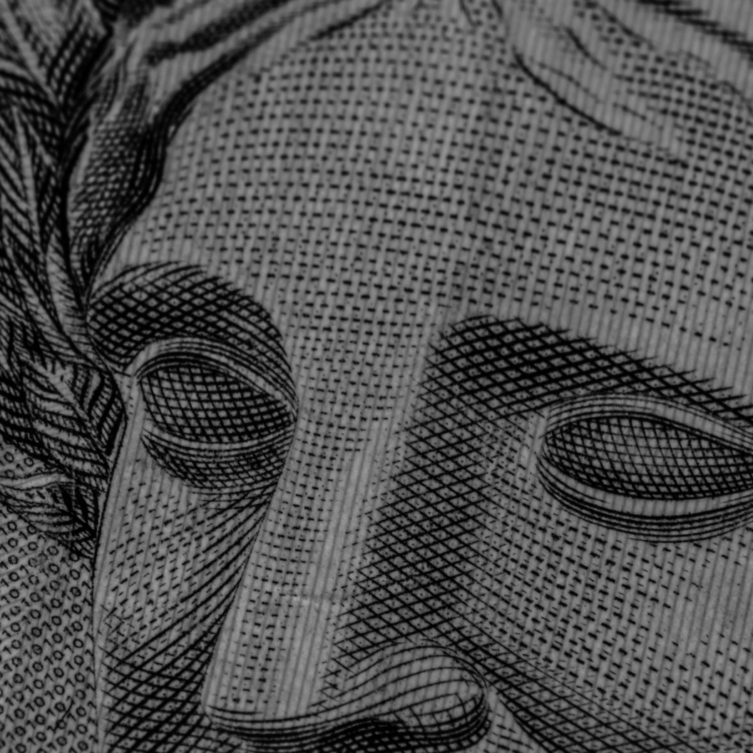 Detailed close-up of engraved lines and patterns on a Brazilian Real banknote face, illustrating expert insights and exclusive market analysis for commodity trends and Market Reports Subscriptions.